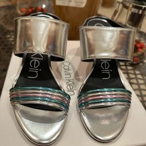 Calvin Klein Silver slip on pumps. New come with box